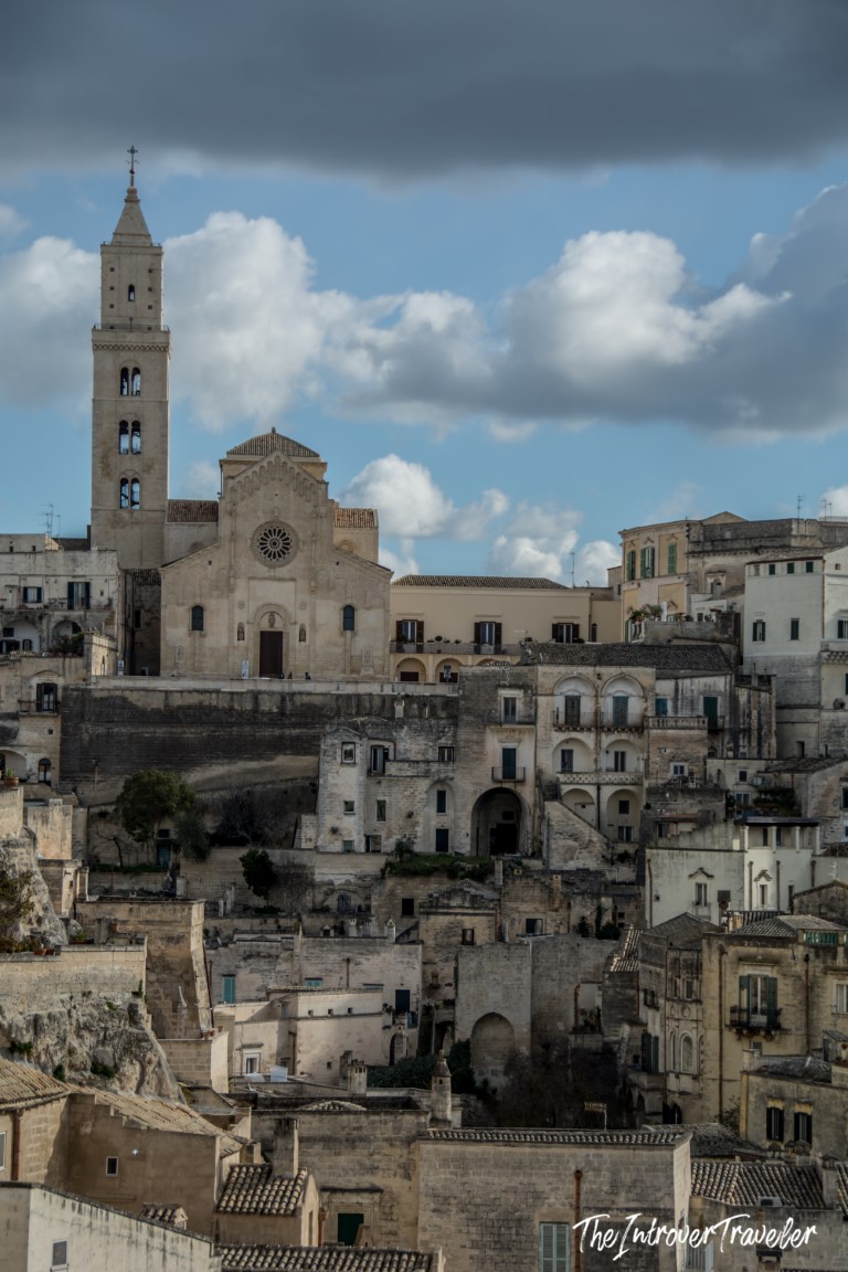 Matera Cathedral with its tall bell tower rising above the ancient Sassi district, Basilicata, Italy