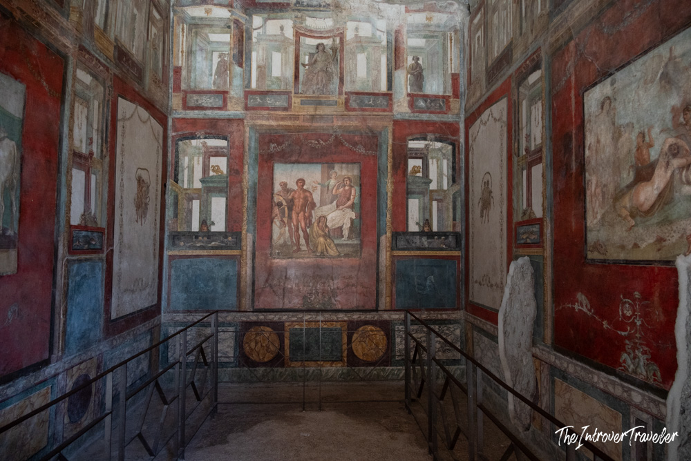 Elaborately painted Roman frescoes covering walls of the Stabian Baths in Pompeii, Italy
