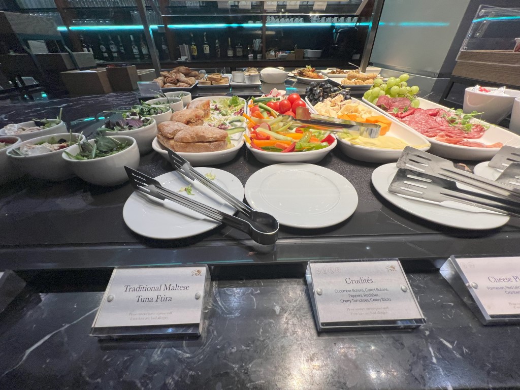 La Valette Lounge buffet with Traditional Maltese Tuna Ftira, crudites, and charcuterie at Malta Airport