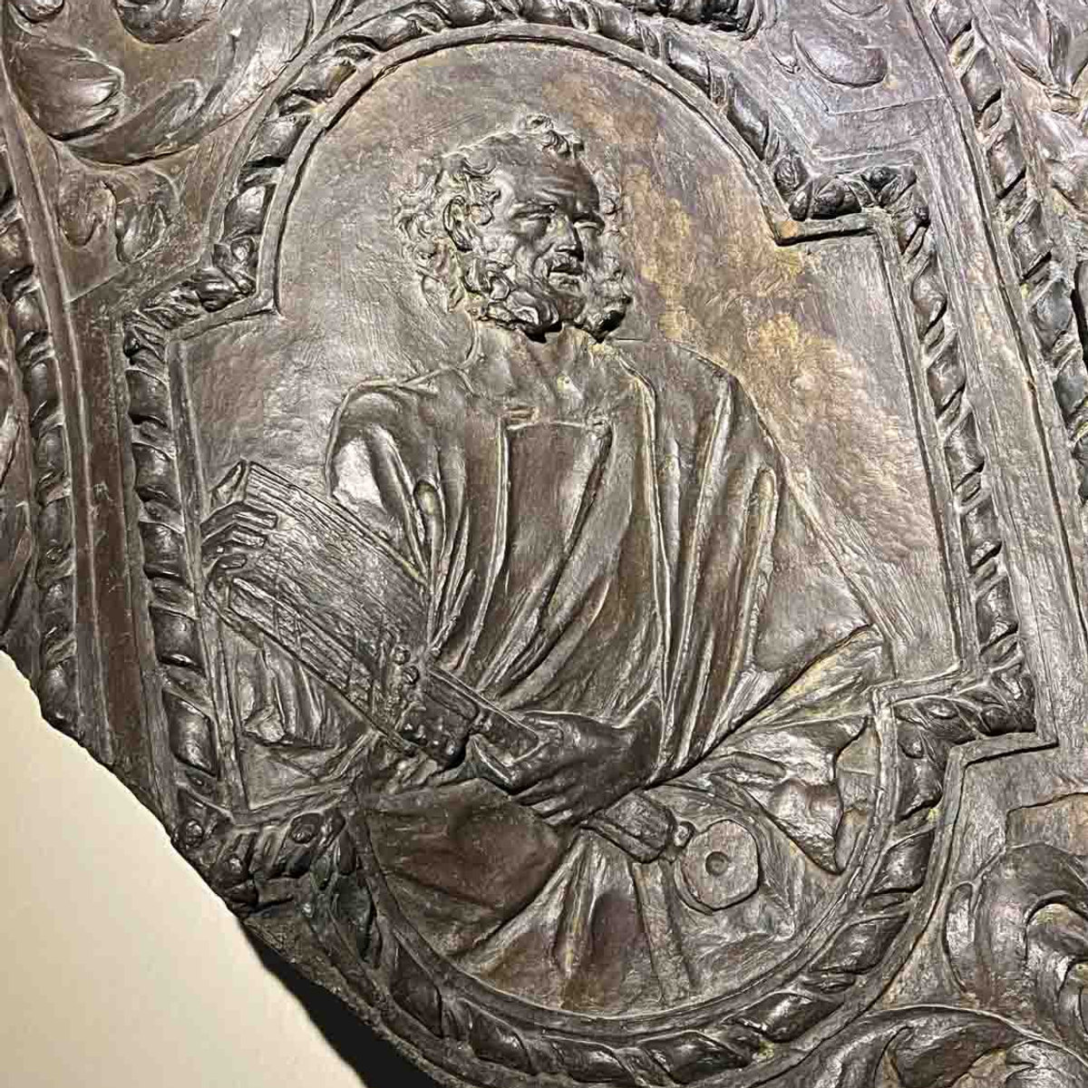 Bronze relief medallion showing a bearded evangelist figure, detail from Bernini's Barberini exhibition at Palazzo Barberini