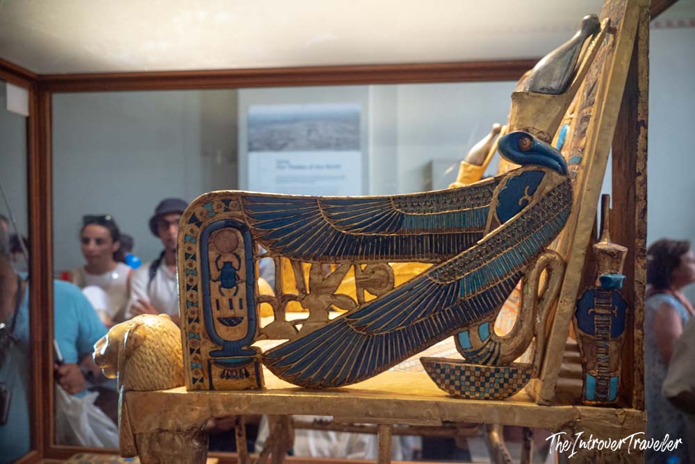 Golden ceremonial throne of Tutankhamun with blue winged goddess detail, Egyptian Museum Cairo