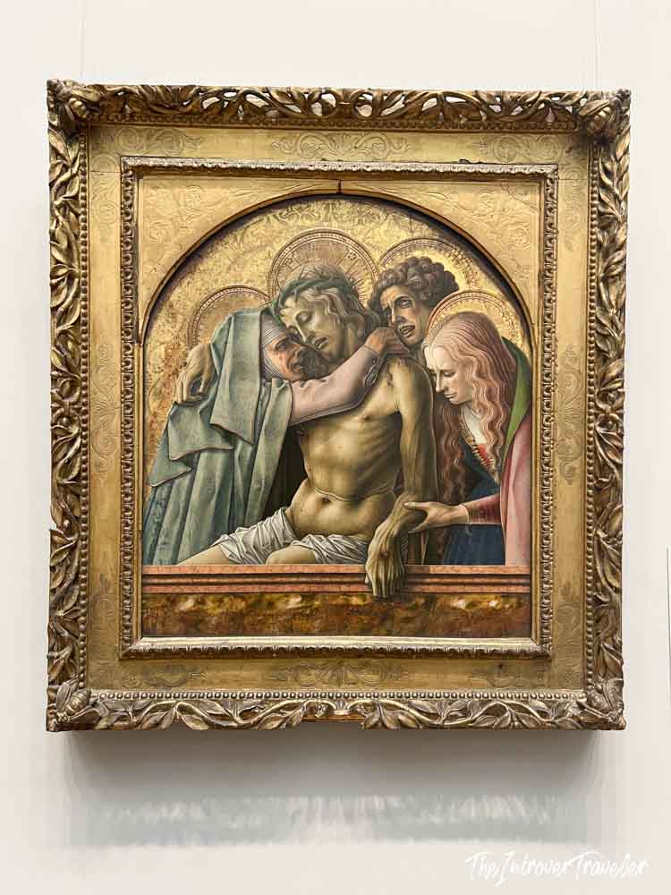 Pietà painting by Carlo Crivelli in an ornate gold frame at the Metropolitan Museum of Art
