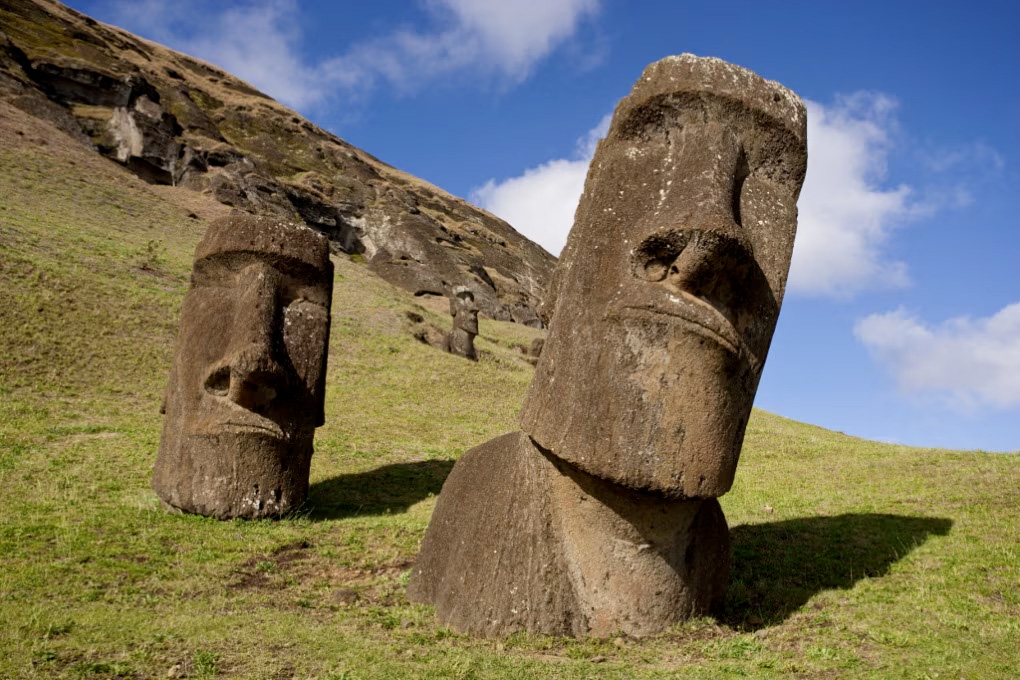 Moai statues on Rano Raraku hillside, Easter Island, compared to Giants of Mont'e Prama