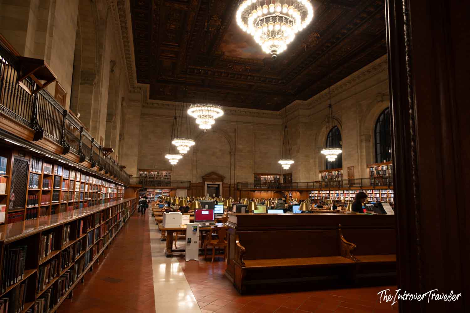 Rose Main Reading Room at the New York Public Library, with chandeliers and oak shelves