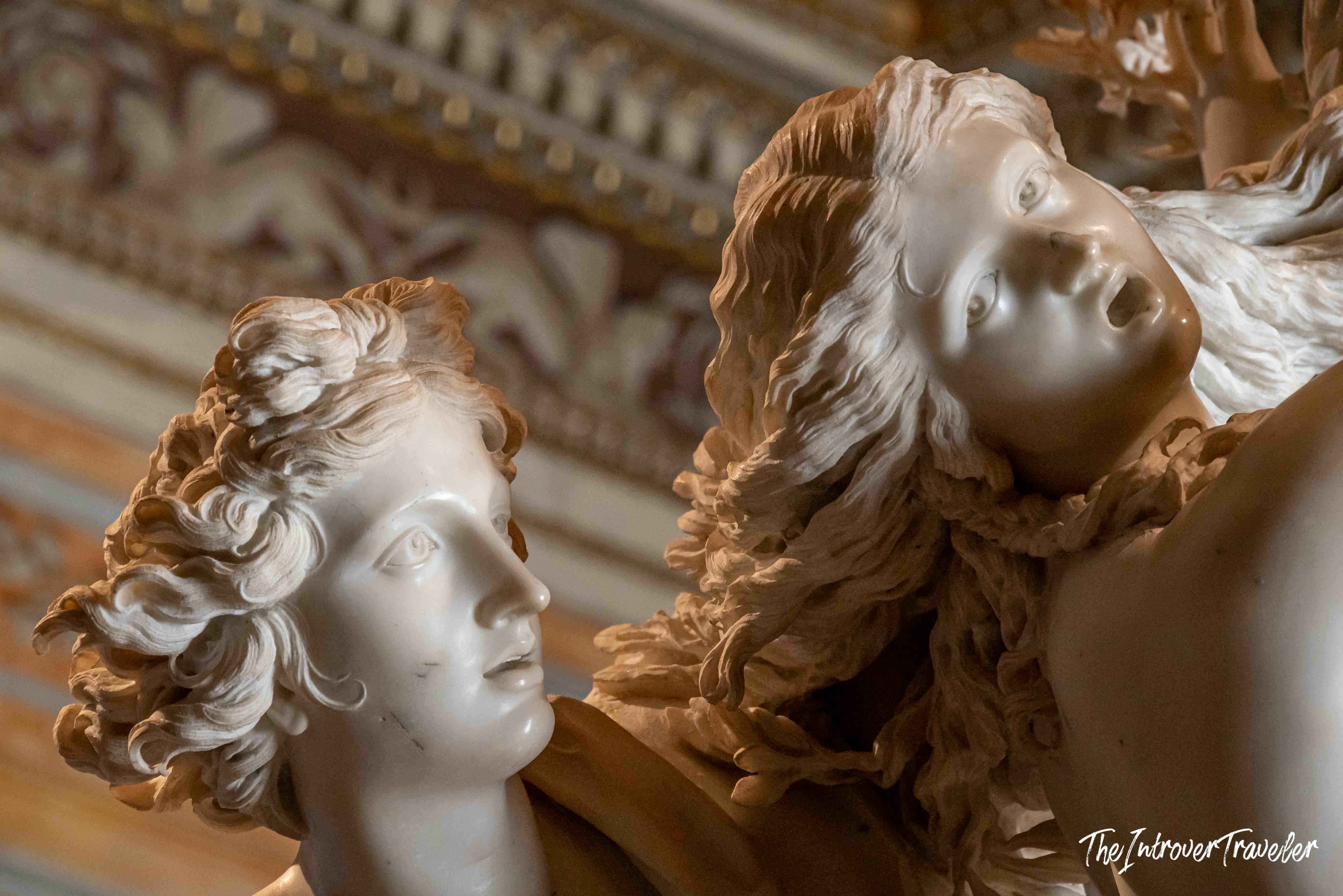 Close-up of marble faces in Bernini's Apollo and Daphne at the Borghese Gallery, Rome