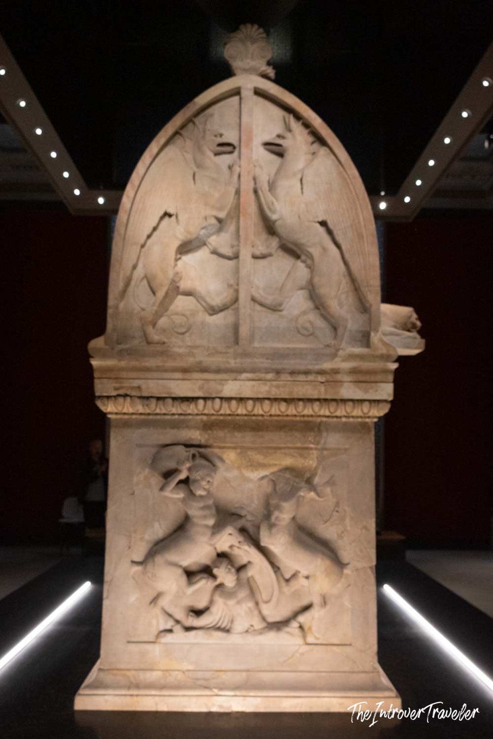 Ancient marble funerary stele with battle reliefs on display at the Istanbul Archaeological Museum