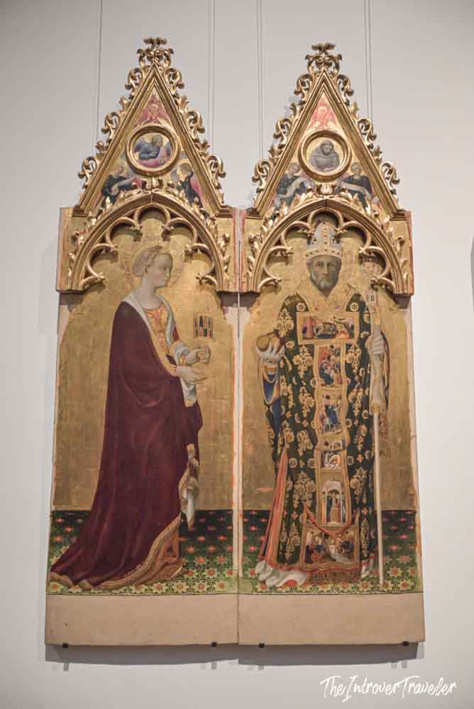 Gothic polyptych with female saint and bishop figure, gold leaf tempera panel at the Uffizi Gallery Florence