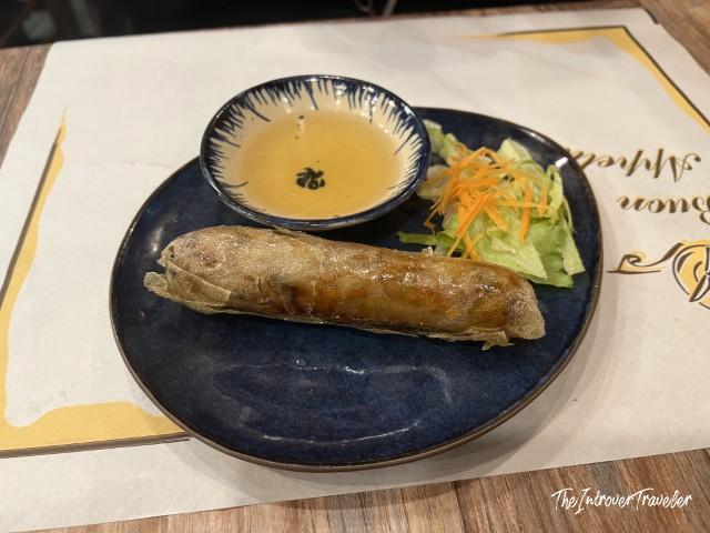 Crispy Vietnamese spring roll with dipping sauce and salad at Fratelli Vietnam, Bologna
