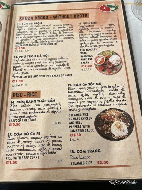 Menu page at Fratelli Vietnam Bologna, showing Vietnamese rice and noodle dishes with Italian descriptions