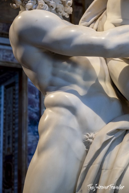 Close-up of Bernini's Pluto and Proserpina torso, showcasing the sculptor's illusionistic marble musculature