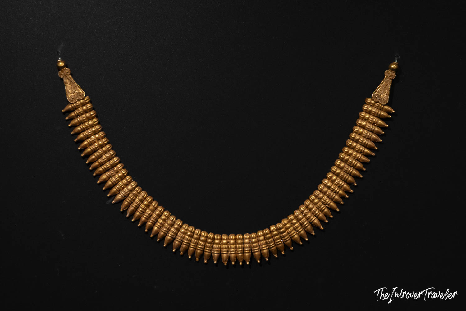 Ancient gold necklace with graduated torpedo beads on display at the Istanbul Archaeological Museum