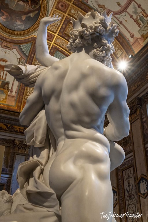 Rear view of Bernini's Pluto and Proserpina, Borghese Gallery Rome, showing sculpted back muscles