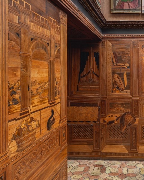 Intarsia wood panels in Federico da Montefeltro's studiolo, Urbino, showing trompe-l'oeil architecture and instruments