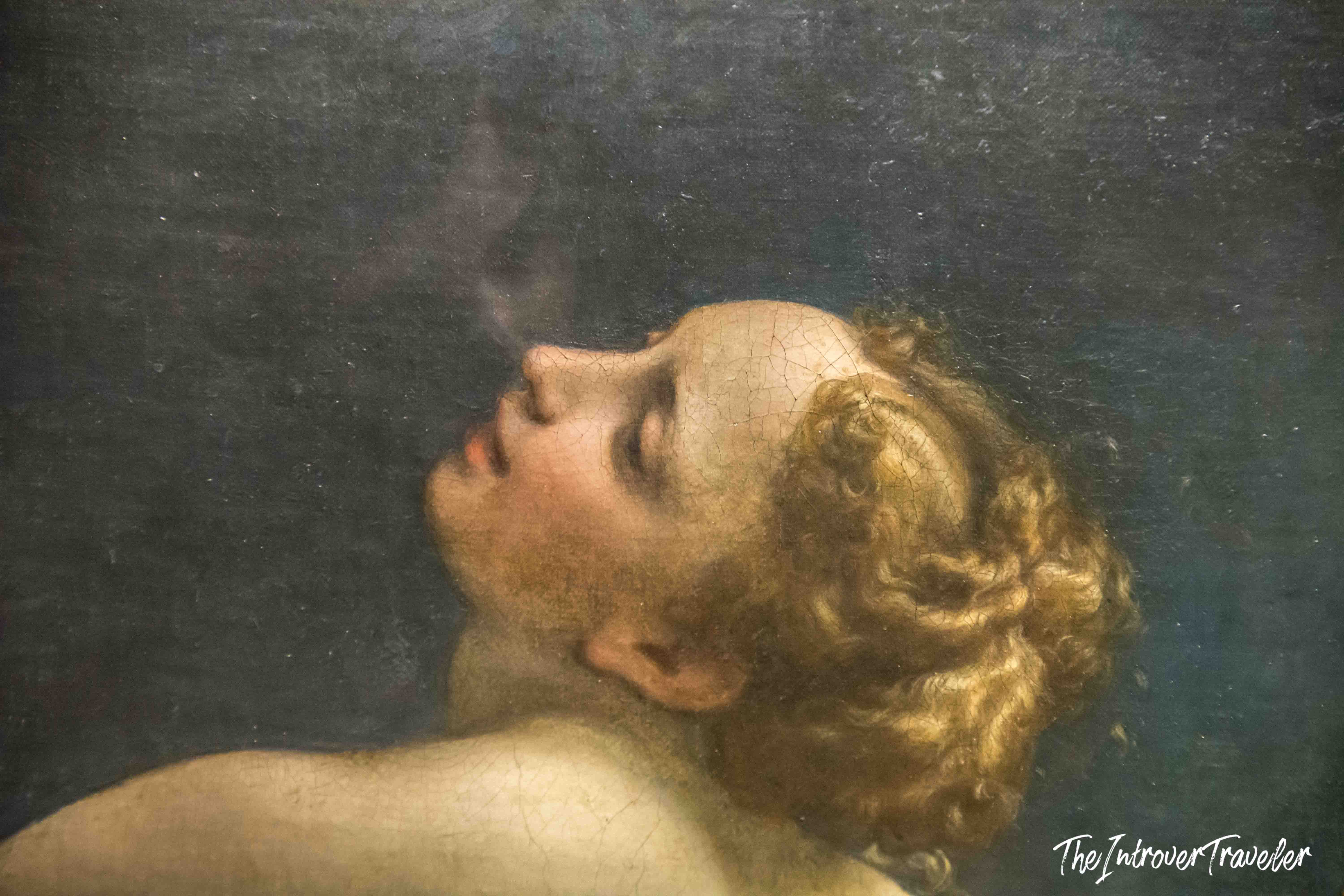 Close-up of Io's face tilted upward in ecstasy, detail from Correggio's Jupiter and Io at the Kunsthistorisches Museum