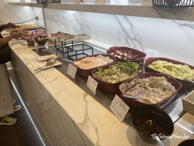 Salad bar spread at the ViP Pau Casals Lounge, Barcelona El Prat Airport buffet
