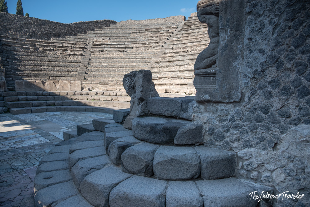 Stone seating tiers and curved steps of the Odeon (Small Theatre) in ancient Pompeii