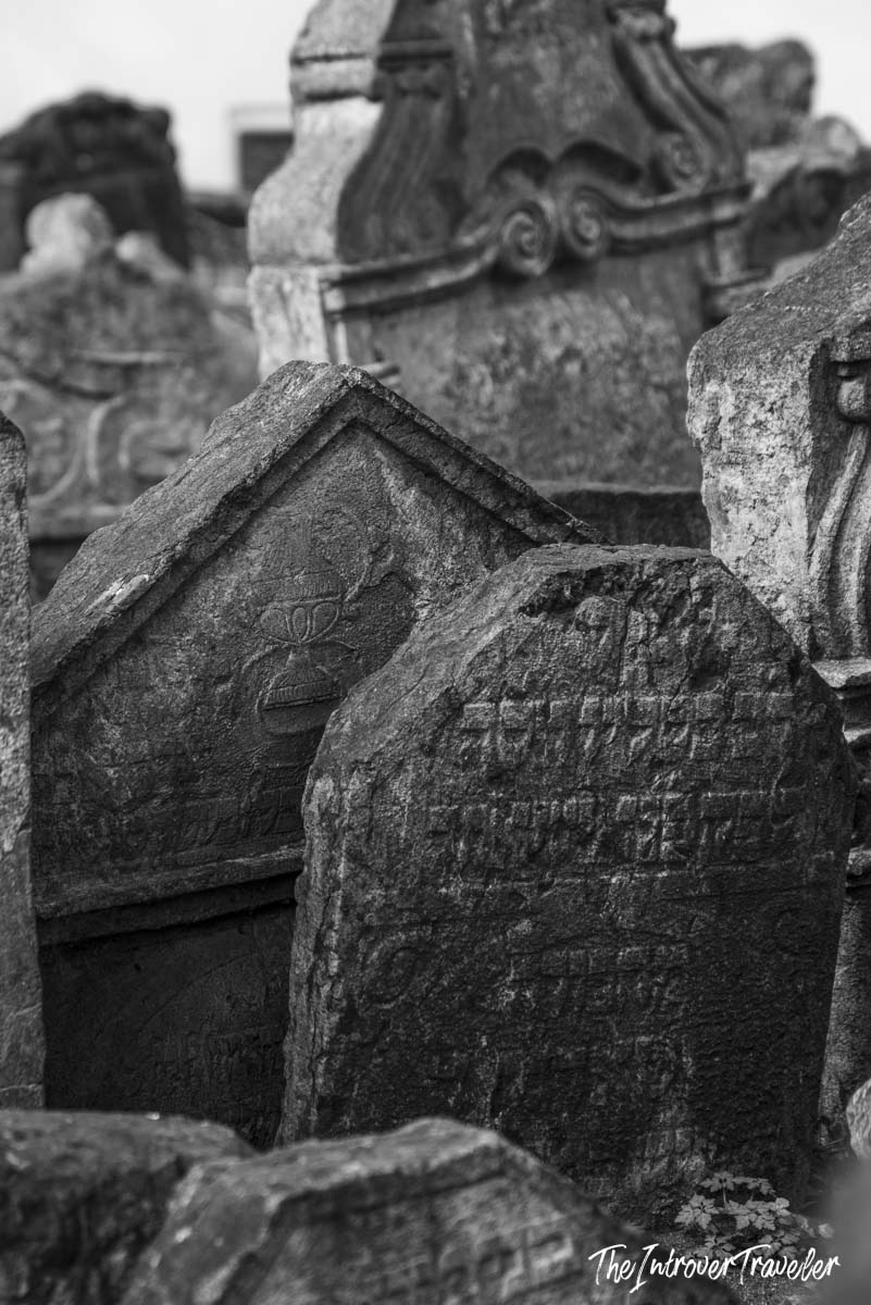 Tightly packed ancient Hebrew-inscribed gravestones at the Old Jewish Cemetery in Prague