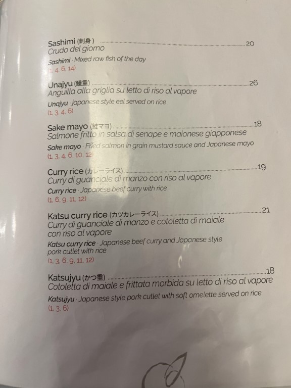 Japanese restaurant Yuzuya Bologna menu showing sashimi, unajyu, katsu curry rice, and katsujyu dishes