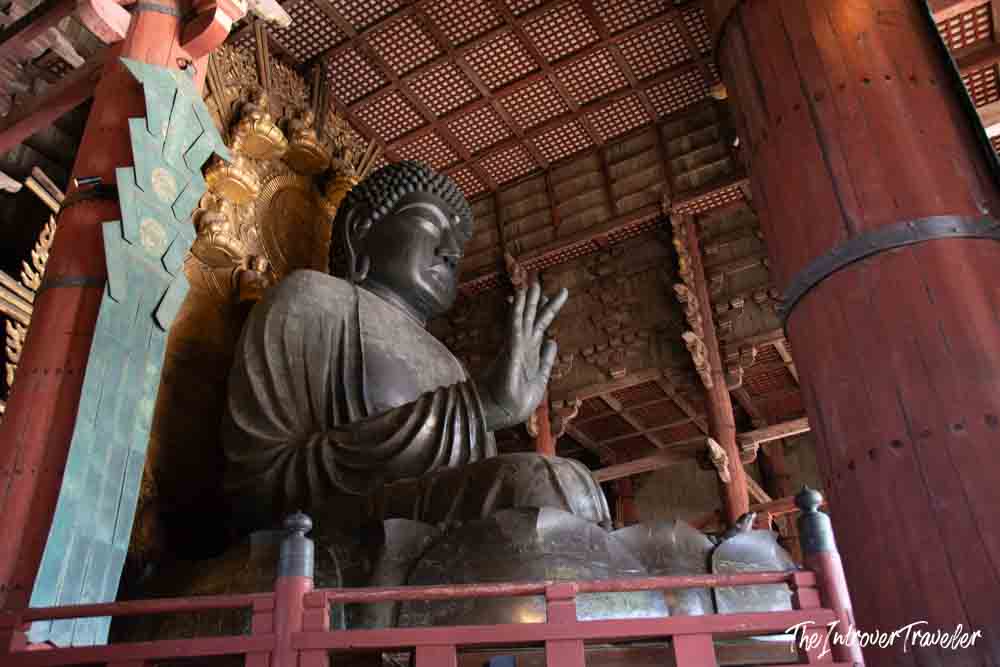 Giant bronze Daibutsu (Great Buddha) inside Todaiji Temple's wooden hall in Nara, Japan