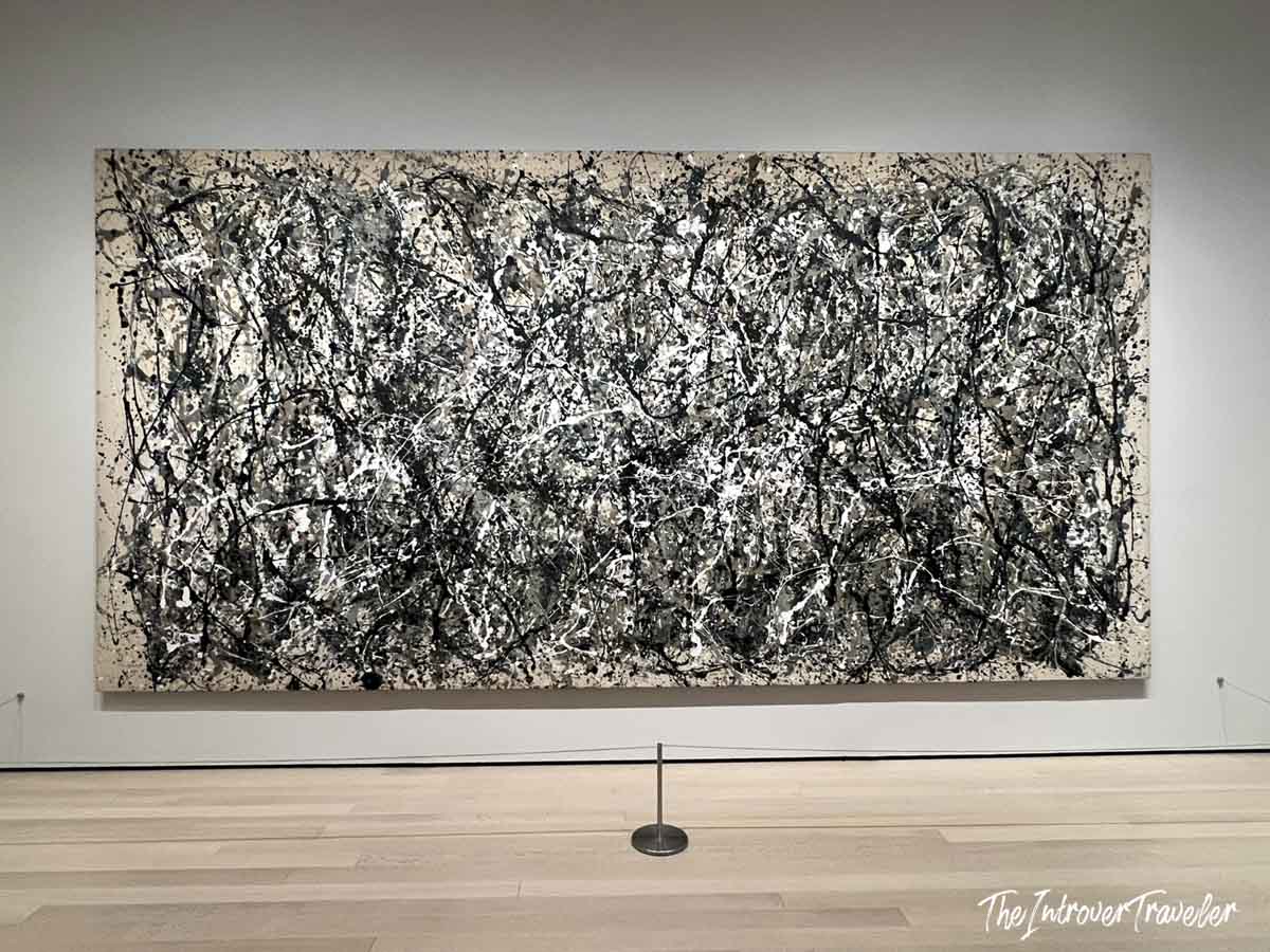 Jackson Pollock's large-scale drip painting displayed at MoMA New York, black and white abstract expressionism