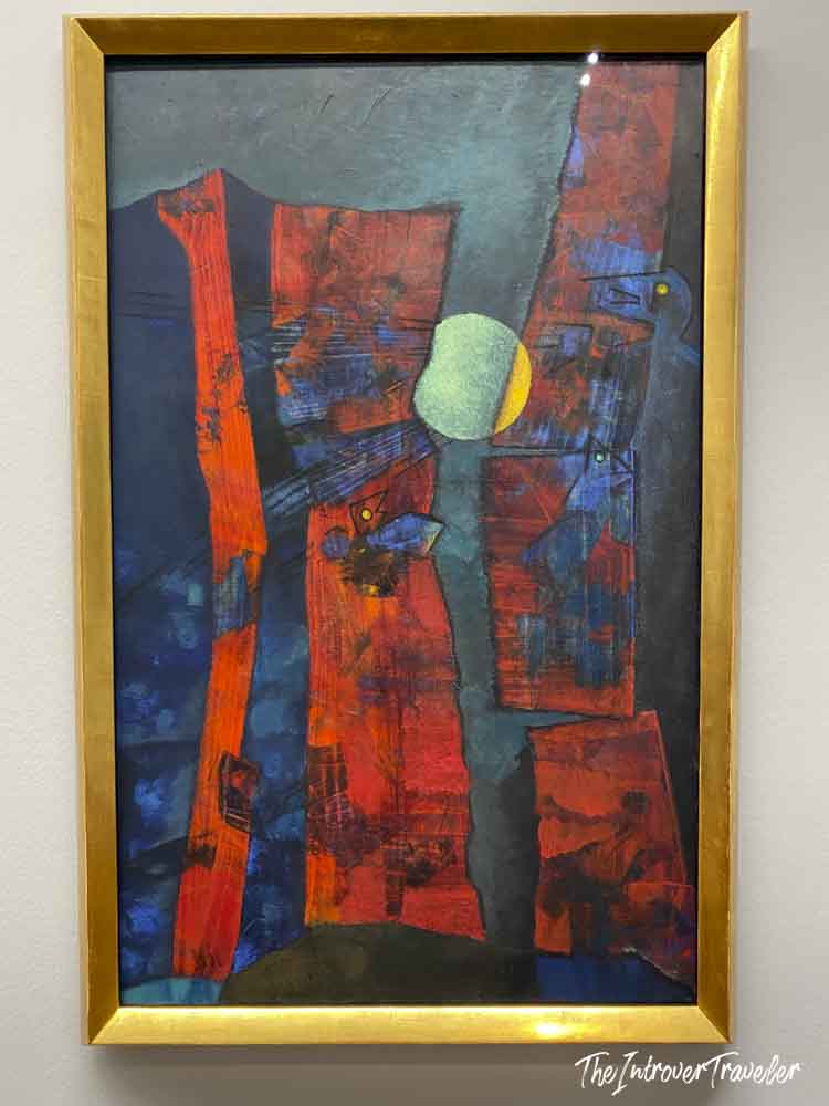 Abstract painting in bold red and blue tones, displayed at the Albertina Museum in Vienna