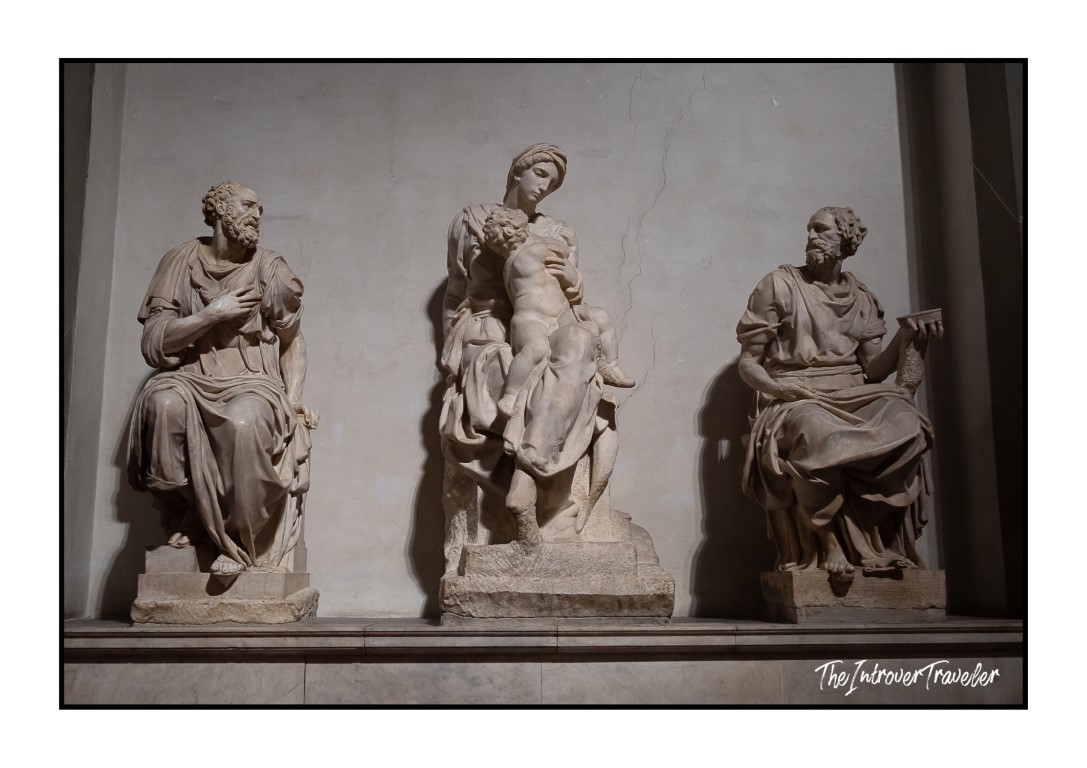 Michelangelo's Medici Madonna flanked by Saints Cosmas and Damian in the New Sacristy, Florence