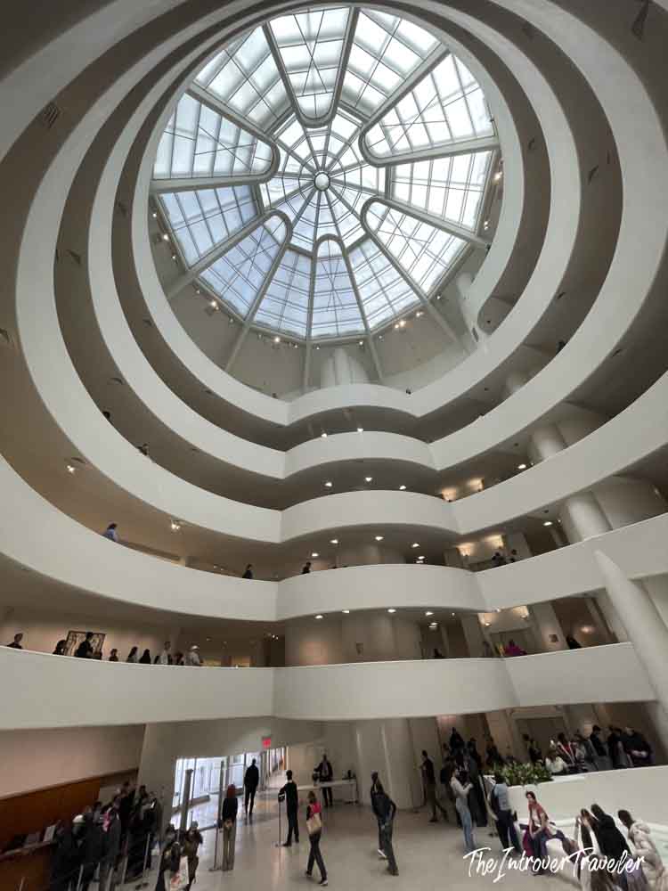 Guggenheim Museum New York rotunda interior with spiral ramps and iconic skylight dome