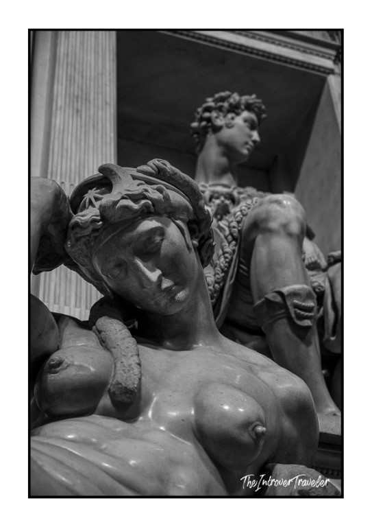 Close-up of Michelangelo's allegorical figure Dawn on the Medici Tombs, Florence