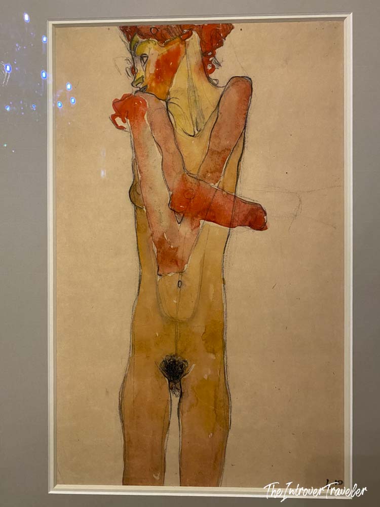 Egon Schiele nude figure drawing, watercolor on paper, displayed at the Albertina Museum Vienna