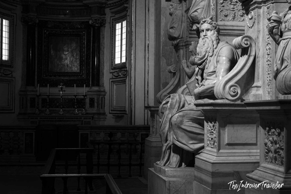 Michelangelo's Moses sculpture at San Pietro in Vincoli, Rome, with intense gaze and flowing marble robes