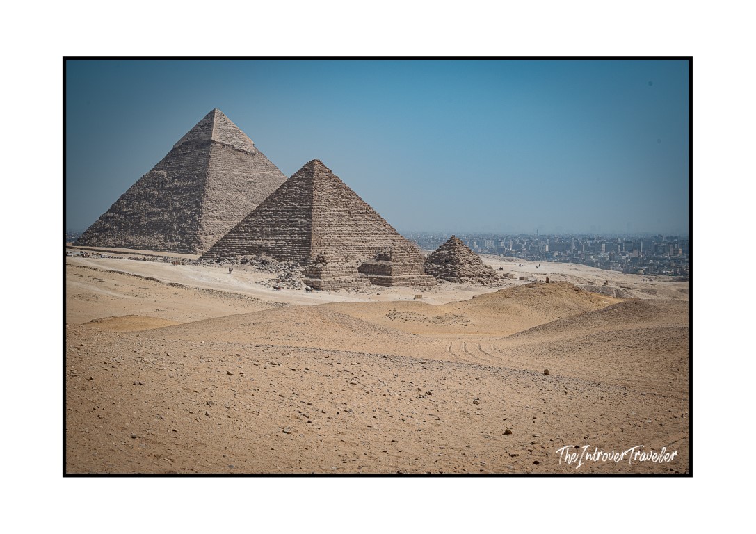 Panoramic view of the Giza pyramid complex, with Khafre and Menkaure rising above the desert plateau near Cairo