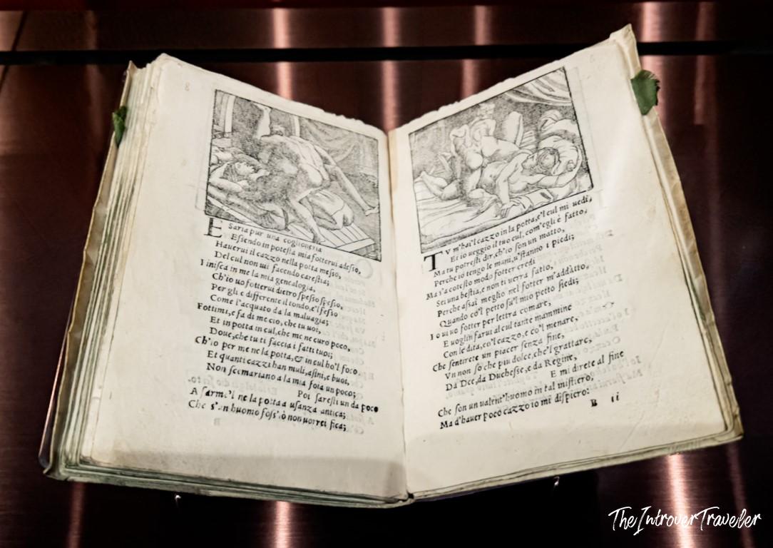 Open pages of I Modi by Marcantonio Raimondi, erotic Renaissance prints on display at the Accademia Gallery Venice