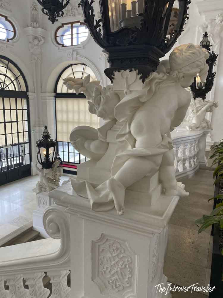 Baroque marble cherub sculpture on the grand staircase of the Upper Belvedere Palace, Vienna