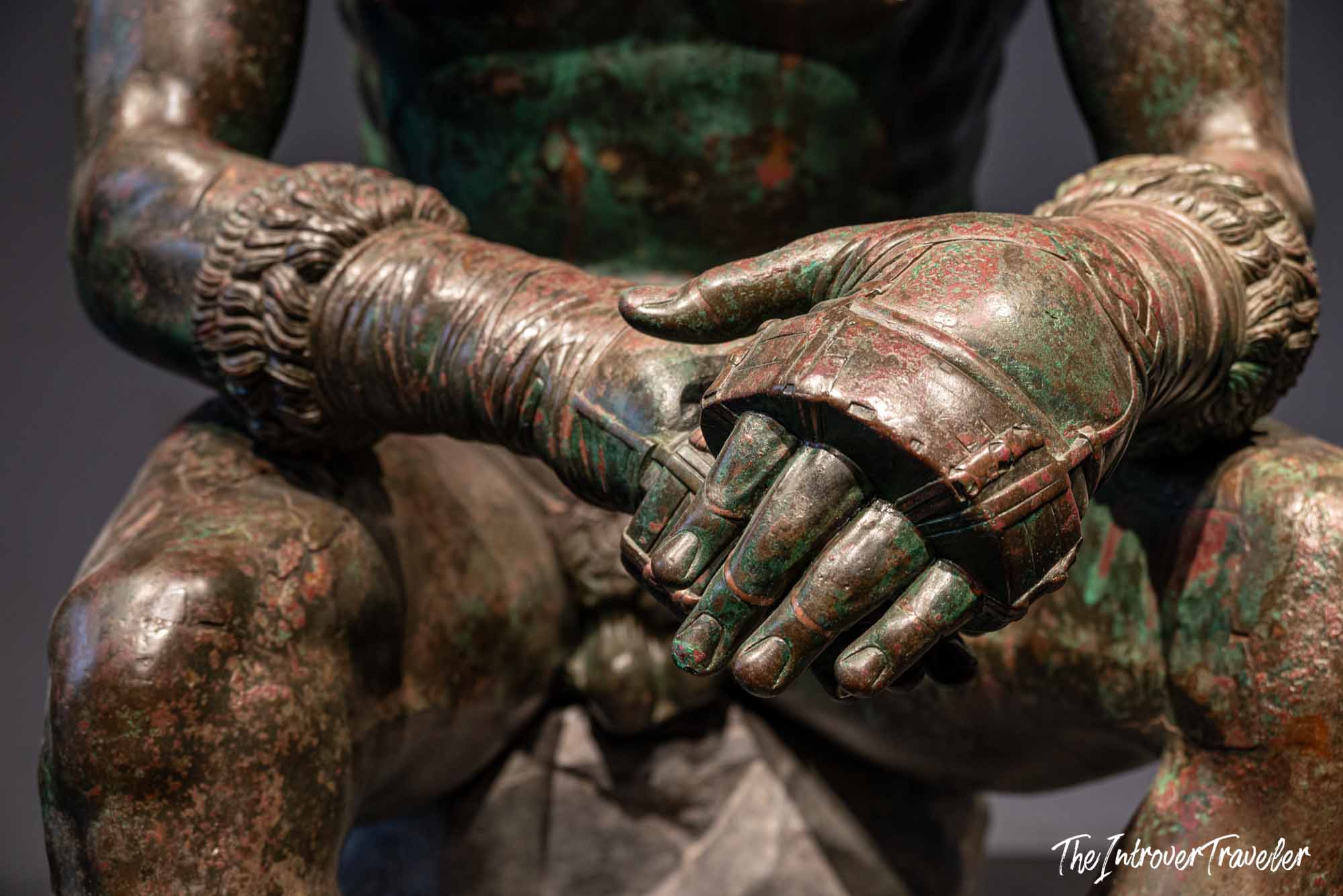 Close-up of the Boxer at Rest bronze hands wrapped in leather caestus, Palazzo Massimo, Rome