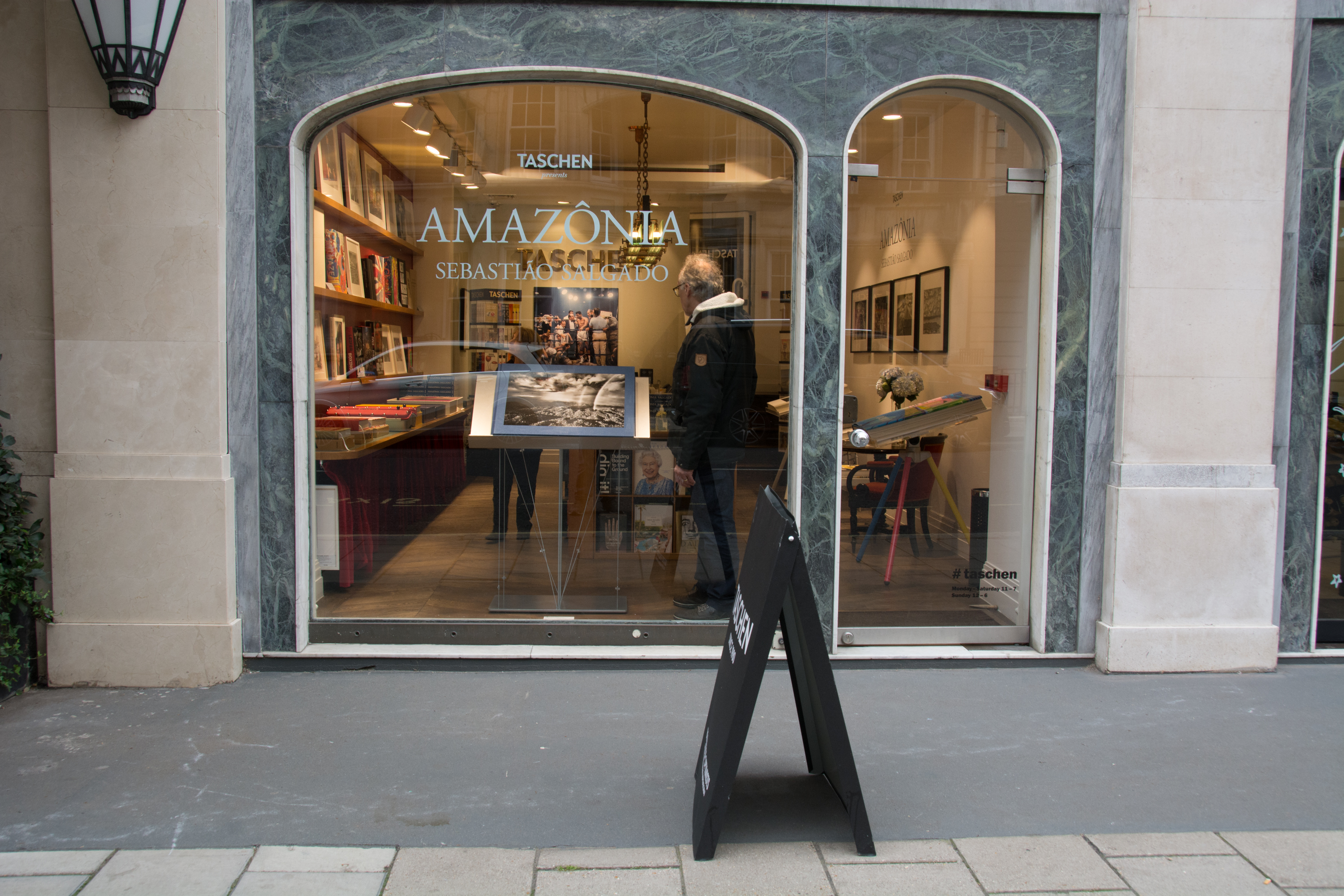 Taschen bookstore window displaying Amazonia by Sebastiao Salgado, London