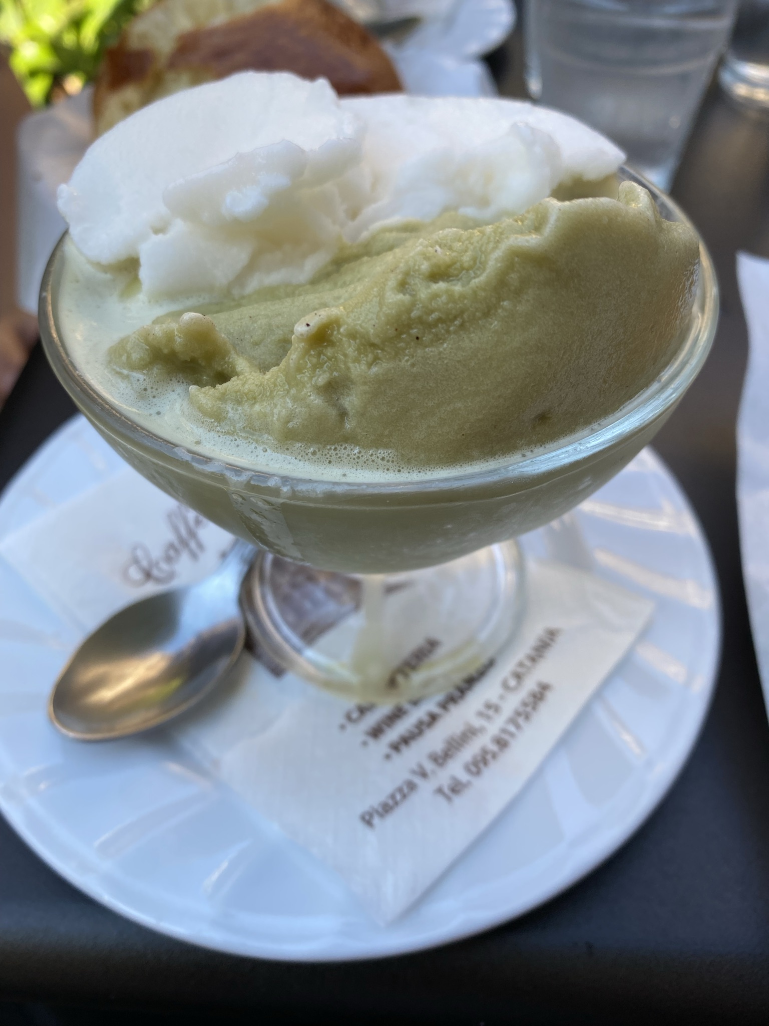 Pistachio granita topped with whipped cream at Caffe Piazza V Bellini, Catania Sicily