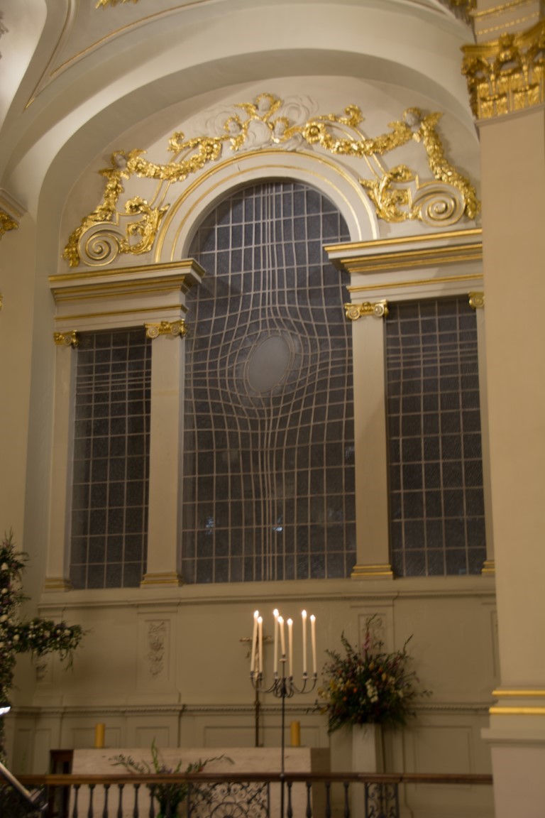 Interior of St. Martin-in-the-Fields church, Trafalgar Square, showing its gilded Baroque decor and altar windows.