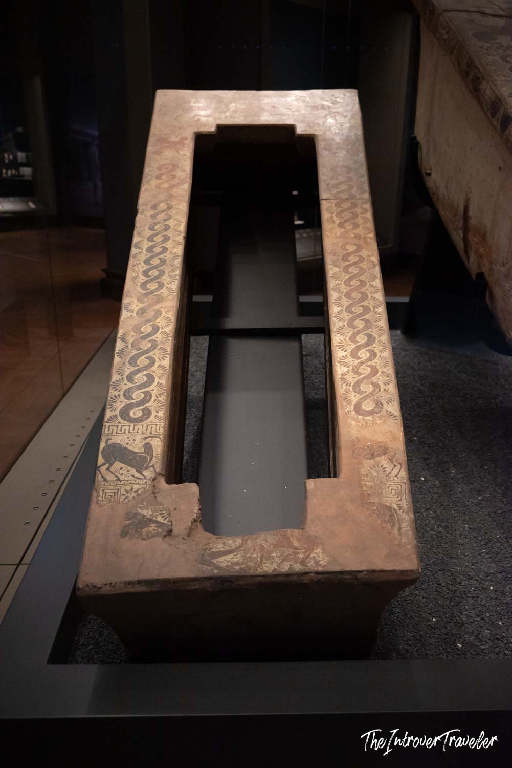 Ancient painted terracotta sarcophagus with spiral and meander motifs at the Istanbul Archaeological Museum