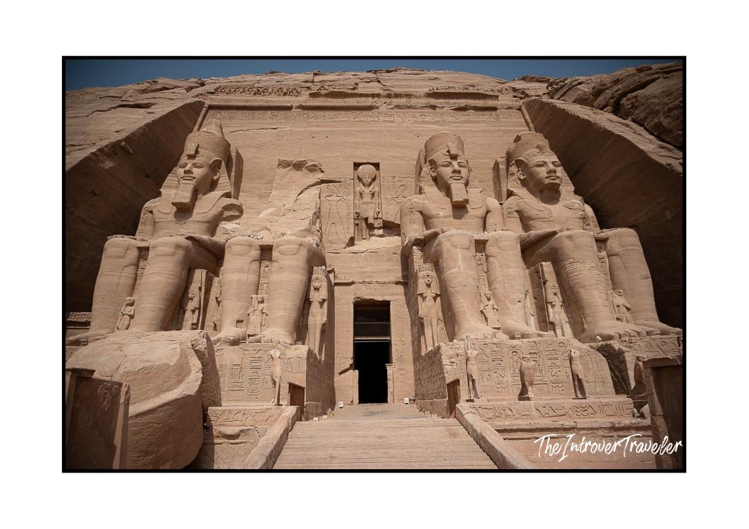Four colossal Ramesses II statues at the facade of Abu Simbel temple, southern Egypt