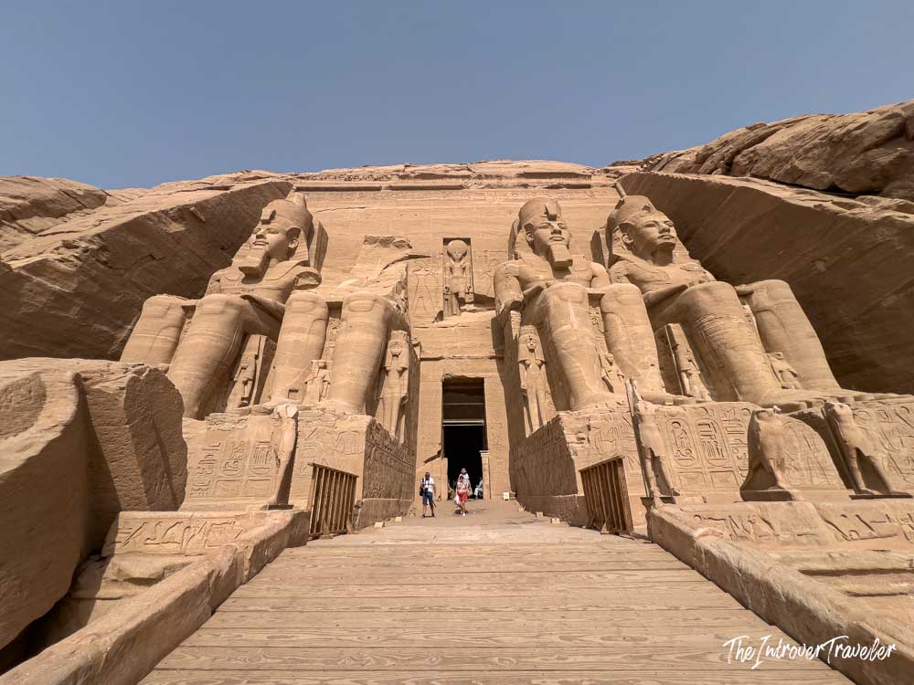 Four colossal statues of Ramesses II flanking the entrance to Abu Simbel temple, Egypt
