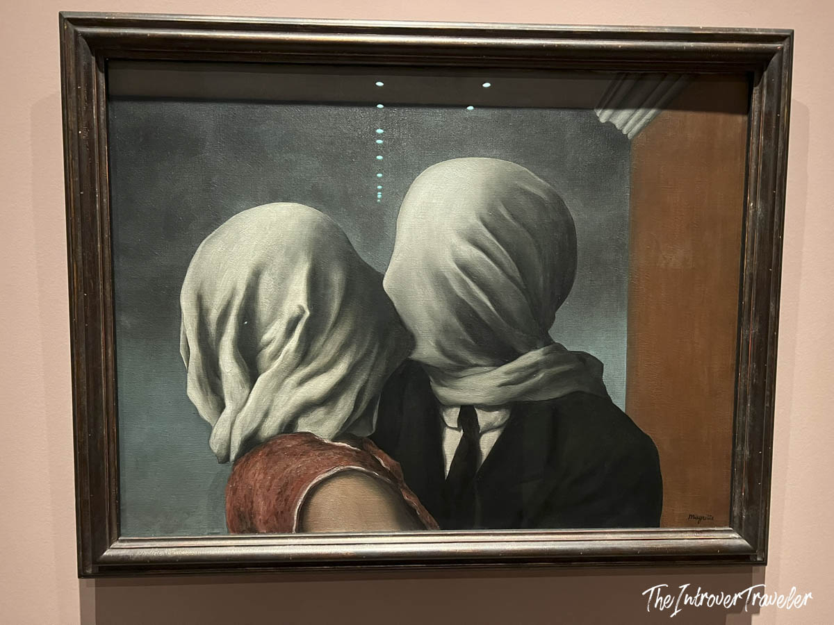 The Lovers by René Magritte, surrealist painting on display at MoMA New York