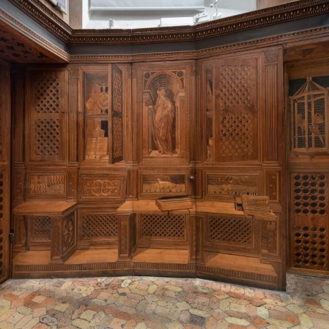 Intricately inlaid wood panels of the Studiolo of Federico da Montefeltro, Urbino, with trompe-l'oeil marquetry