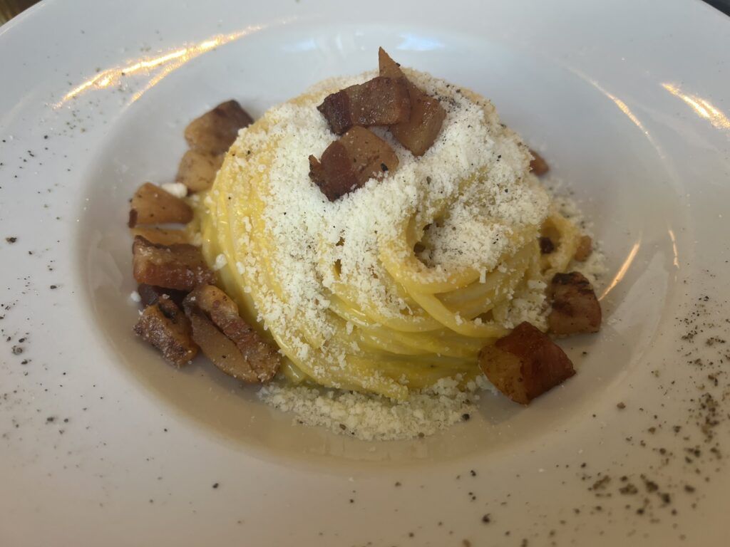 Spaghetti alla carbonara at Hosteria Grappolo d'Oro, Rome, with guanciale, pecorino, and black pepper