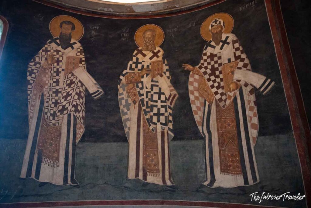Byzantine fresco of three haloed bishops in ornate vestments, Chora Church Istanbul