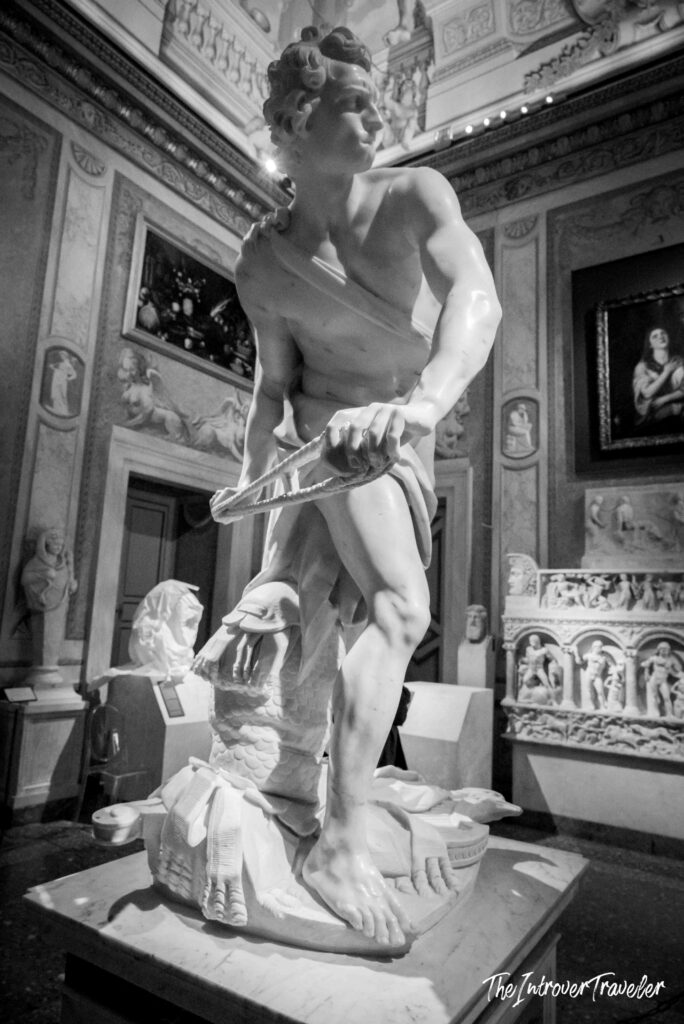 Bernini's David marble sculpture mid-action at the Borghese Gallery in Rome