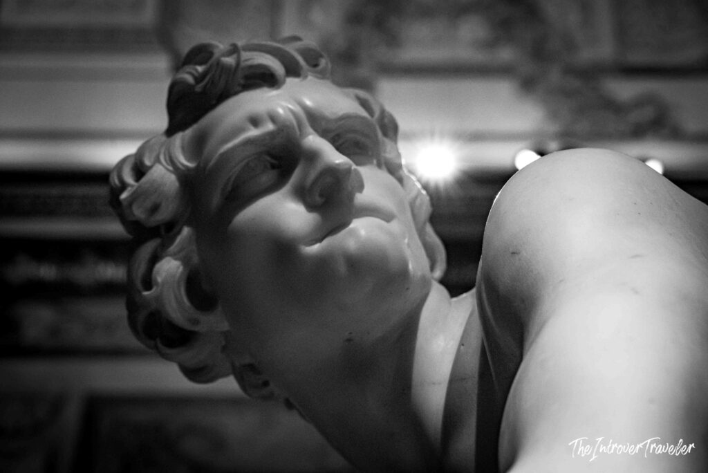 Close-up of Bernini's David face, intense gaze captured in marble at the Borghese Gallery, Rome