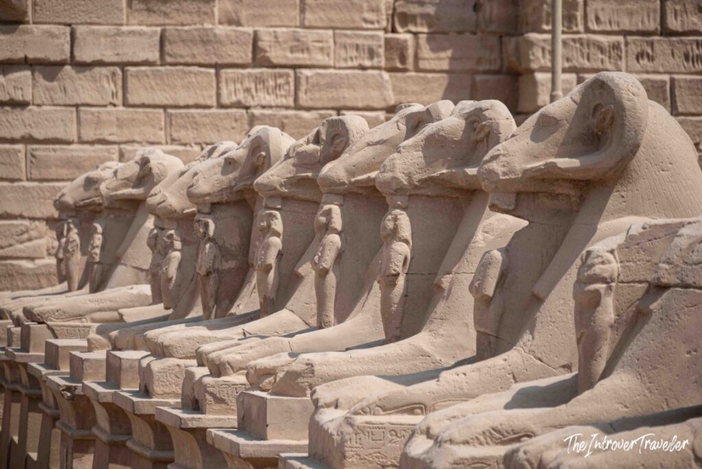 Row of ram-headed sphinxes lining the Avenue of Sphinxes at Karnak Temple Complex, Luxor