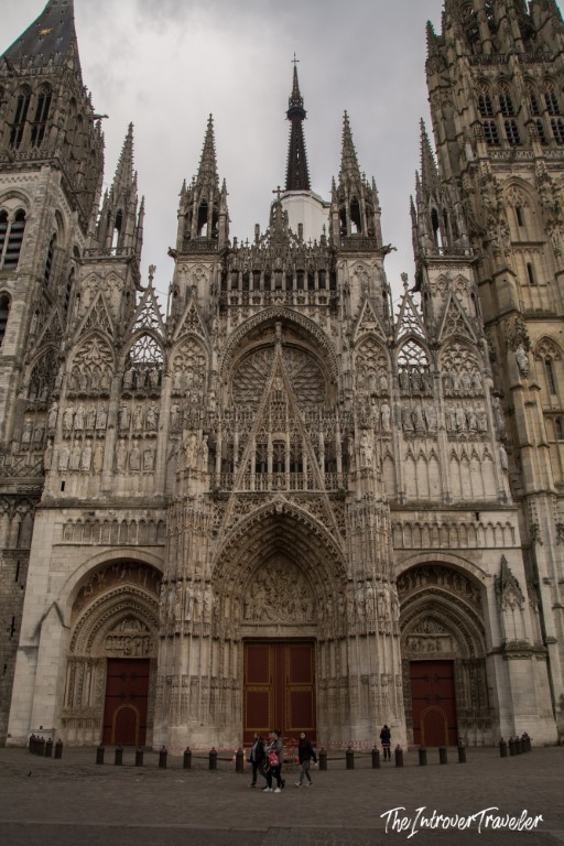 Rouen Cathedral Gothic facade with ornate stone carvings and twin towers, Normandy France