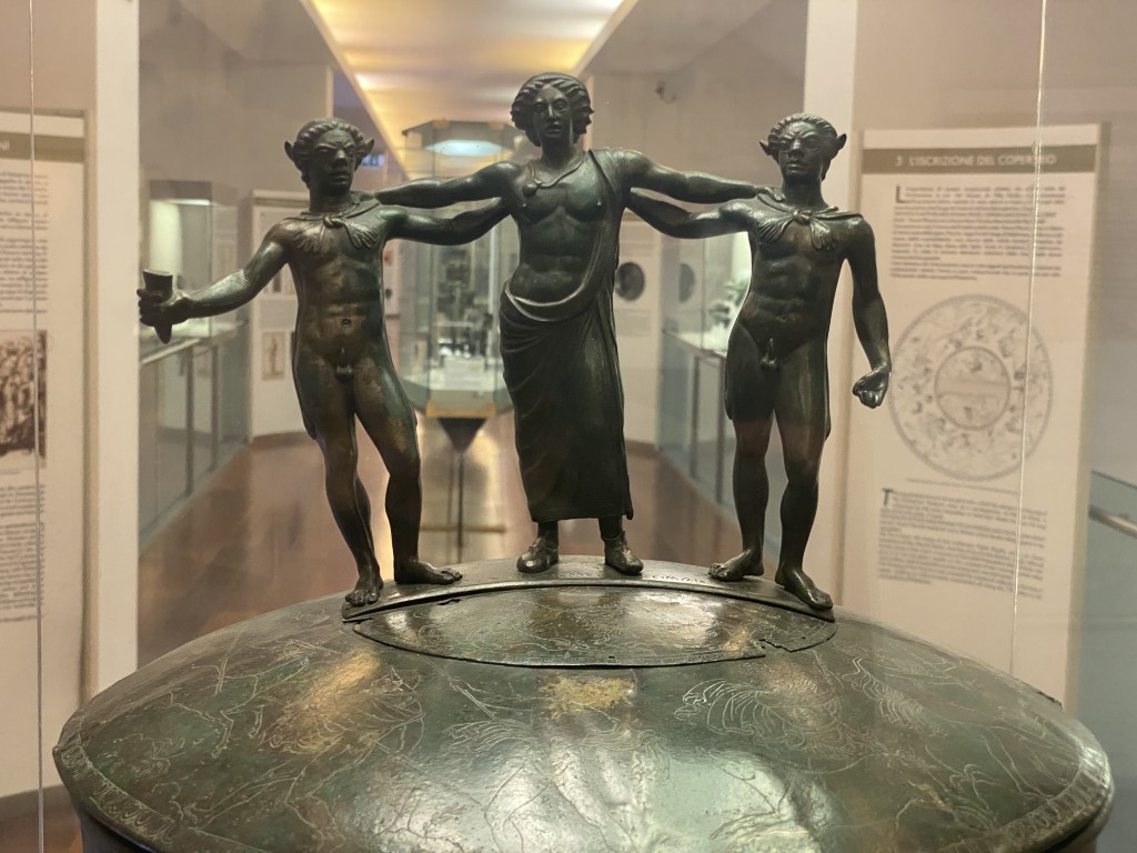 Bronze Etruscan cista lid with three figures, Villa Giulia Etruscan Museum, Rome