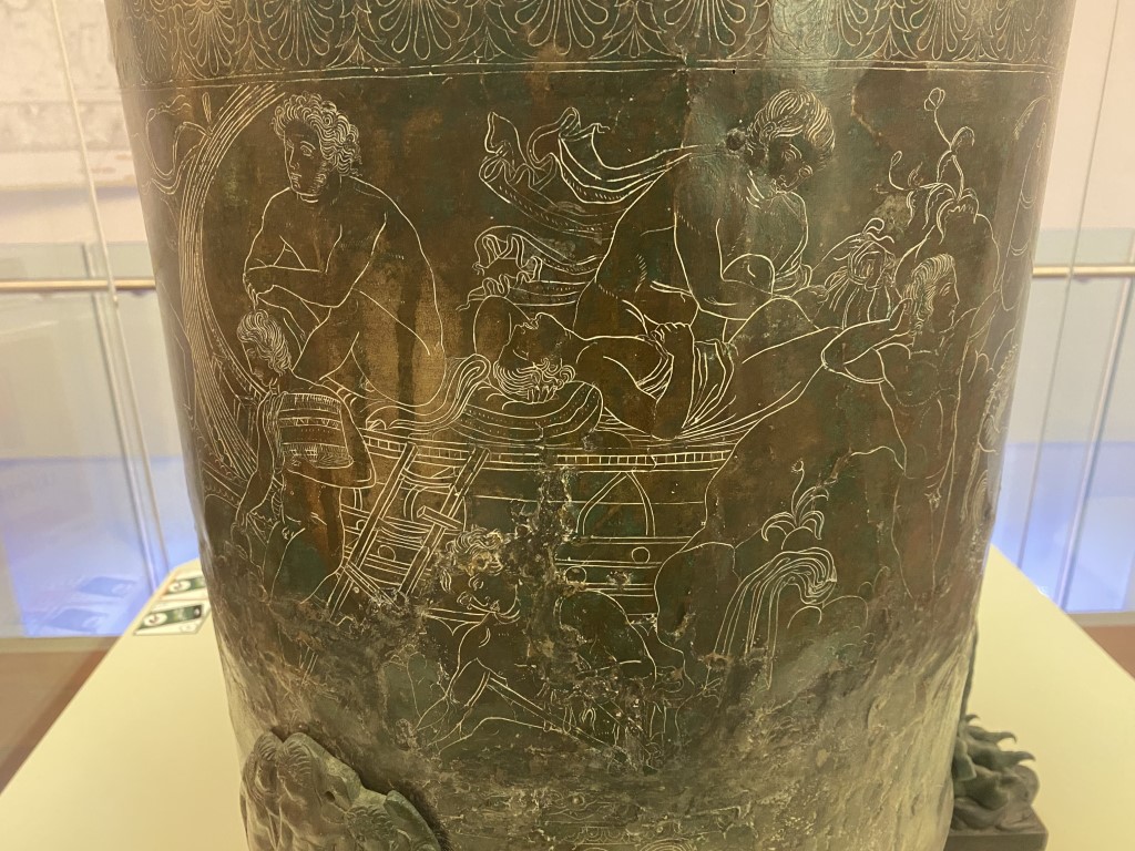 Close-up of engraved mythological scene on an ancient Etruscan bronze vessel, Villa Giulia Museum Rome